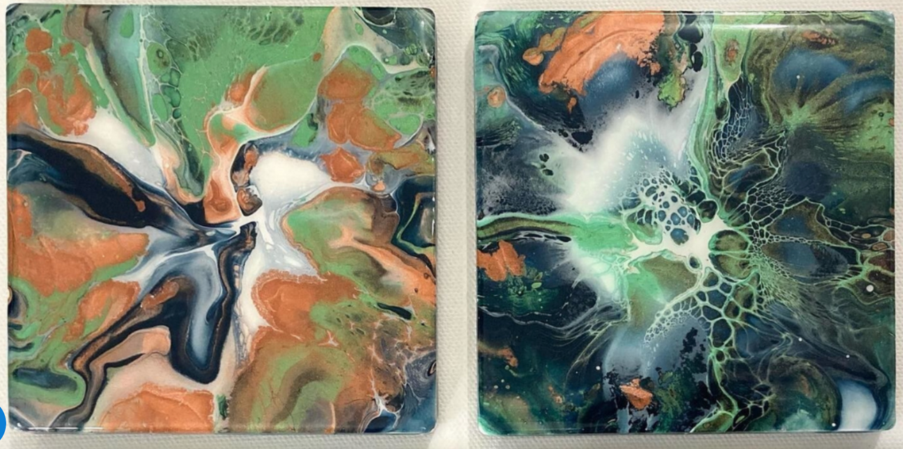 two green orange and gray resin art coasters made with acrylic paint